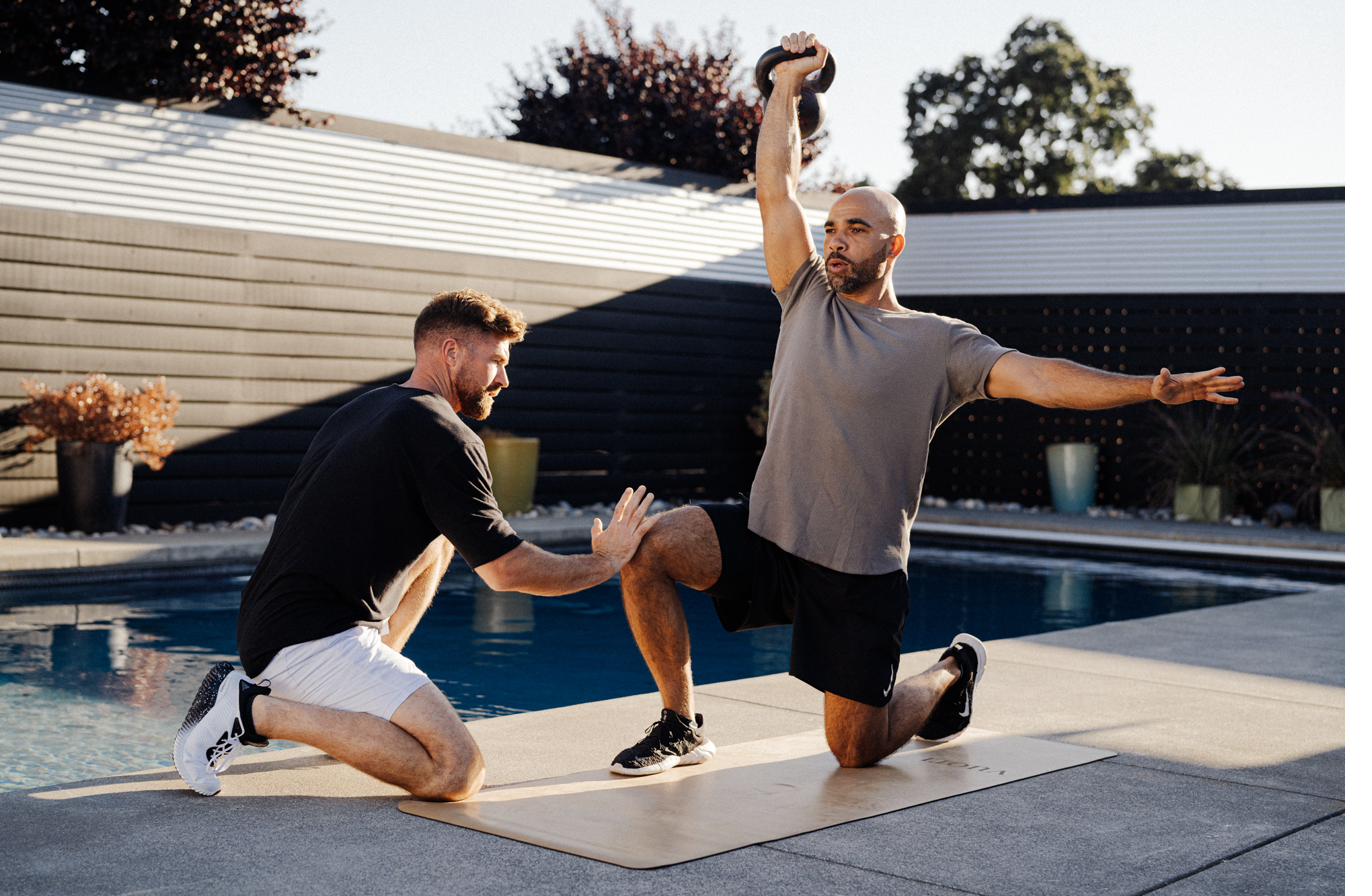 Rich coaching client poolside